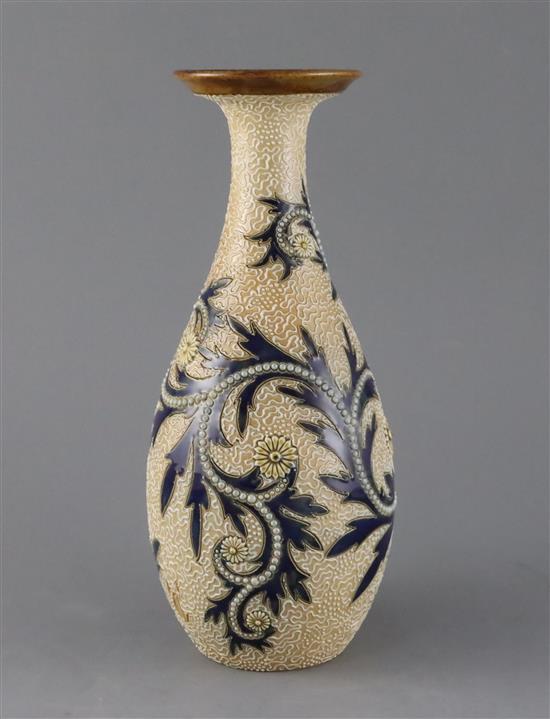 George Tinworth for Royal Doulton, a foliate and vermicular decorated bottle vase, c.1905, 27cm